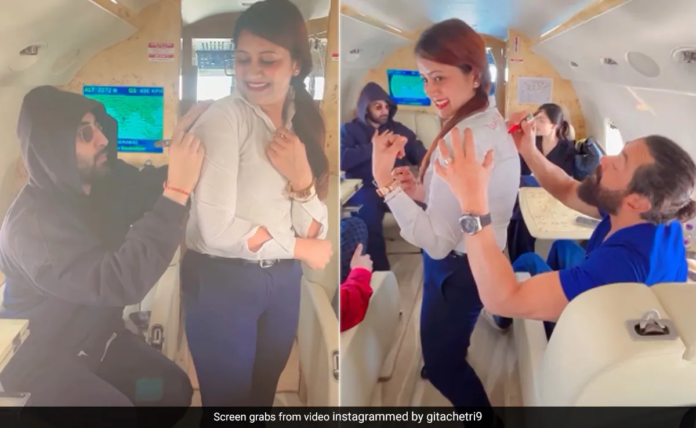 Sky-High Glamour: Flight Attendant Soars as 'Animal' Cast, Including Ranbir Kapoor and Bobby Deol, Sign Her Uniform in Unforgettable In-Flight Encounter