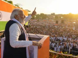 मोदी सरकार की बड़ी उपलब्धि 2026: ₹2,400 करोड़ रोजगार प्रोत्साहन और रिकॉर्ड PM कार्यकाल | WiiNewsDaily मोदी सरकार योजना 2026 — प्रधानमंत्री नरेंद्र मोदी जन सभा को संबोधित करते हुए